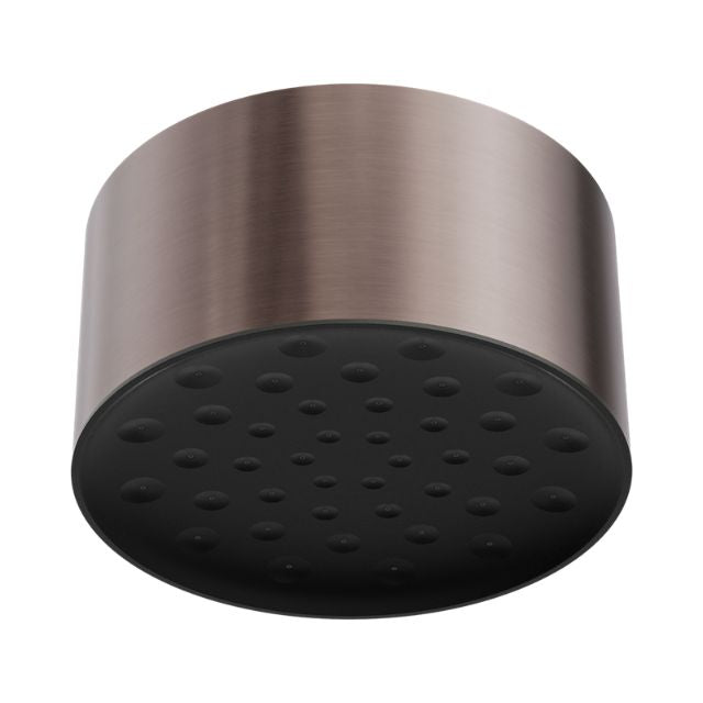 Nero Serenity ceiling shower head in brushed bronze, round overhead rain shower with black faceplate.