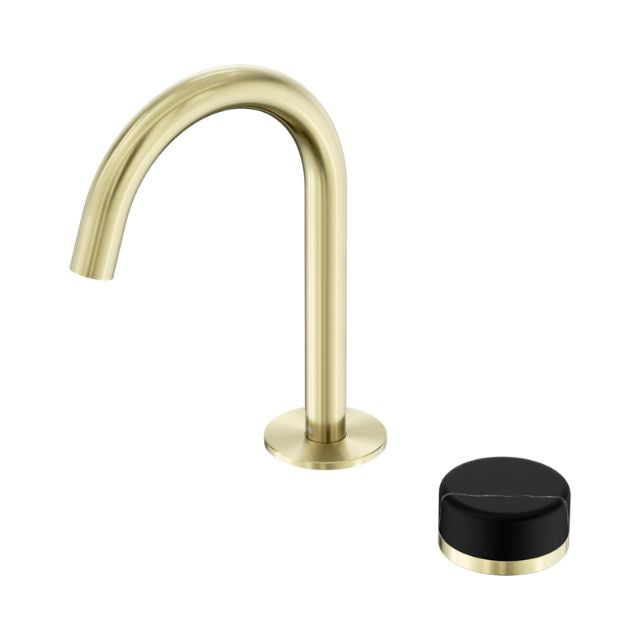 Nero Serenity progressive basin mixer with arc spout, brushed gold finish and Marquina black handle on white background