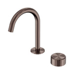 Nero Serenity progressive basin mixer with arched spout and metal handle in brushed bronze, shown on white background