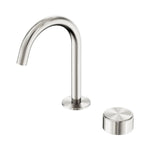 Nero Serenity brushed nickel progressive basin mixer with arc spout and round metal handle, isolated on white background