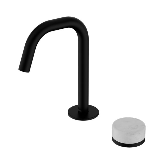 Nero Serenity matte black basin mixer with curved edge spout and white Carrara handle shown separate on white background