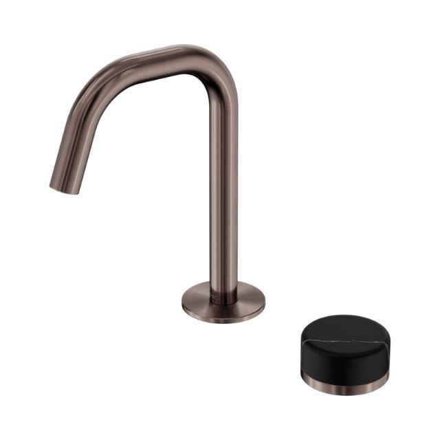 Nero Serenity basin mixer with brushed bronze edge spout and black marble handle, isolated on white