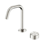 Nero Serenity basin mixer tap in brushed nickel with edge spout and metal handle, shown with round base and control cap
