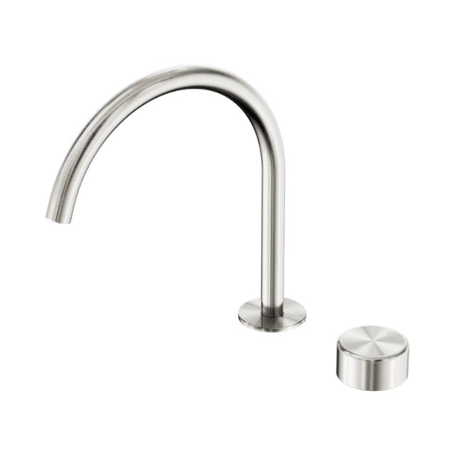 Nero Serenity progressive mixer with tall arc spout and metal handle in brushed nickel, isolated on white