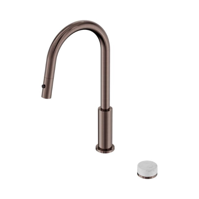 Nero Serenity pull out kitchen mixer tap in brushed bronze with Carrara handle, isolated on white