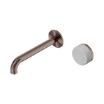 Nero Serenity wall basin mixer in brushed bronze with Carrara marble handle and 220mm spout, shown on white background