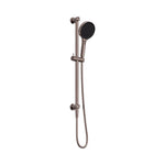 Nero Serenity rail shower in brushed bronze with hand shower, wall-mounted rail and hose on white background