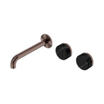 Nero Serenity wall basin set in brushed bronze with offset spout and two black Marquina-style handles on white background