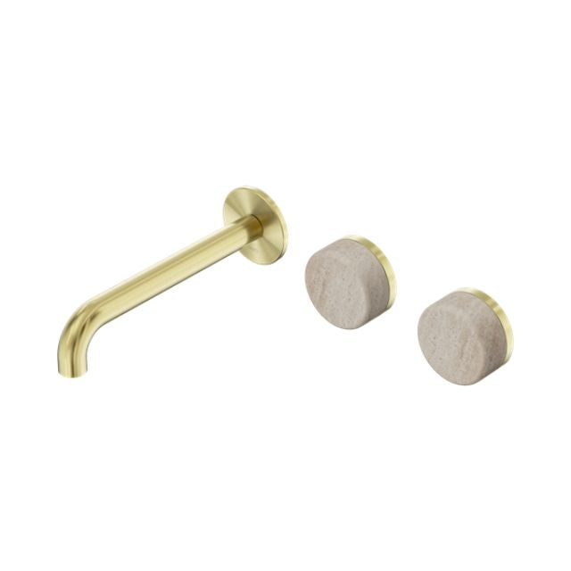 Nero Serenity wall basin set in brushed gold with 185mm offset spout and two travertine handles, wall-mounted on white background