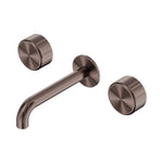 Nero Serenity wall basin set with 185mm spout and metal handles in brushed bronze, isolated on white