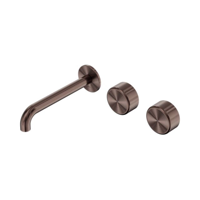 Nero Serenity wall basin set in brushed bronze with 220mm offset spout and two metal handles, on white background