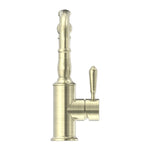 Nero York basin mixer tap with hook spout and metal lever in aged brass, side view