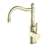 Nero York aged brass basin mixer tap with hook spout and metal lever handle, front view on white background