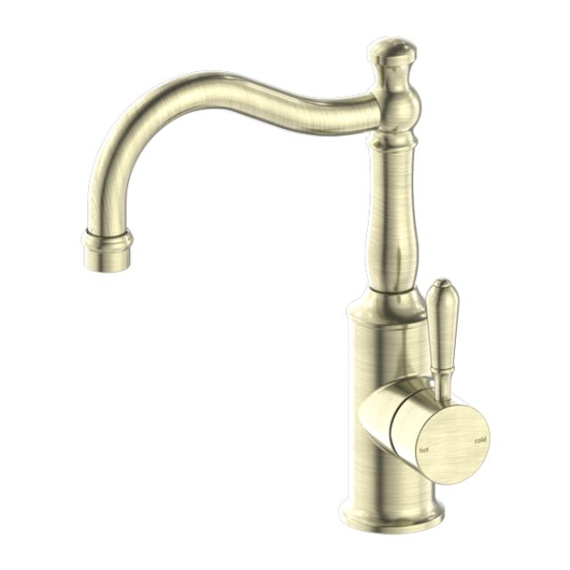 Nero York aged brass basin mixer tap with hook spout and metal lever handle, front view on white background