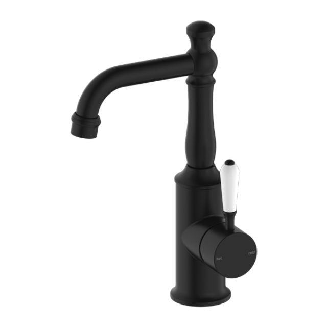 Nero York matte black basin mixer with white porcelain lever, hob mounted tap on white background