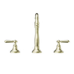 Nero York three-piece basin tap set in aged brass with metal lever handles, shown front on white background