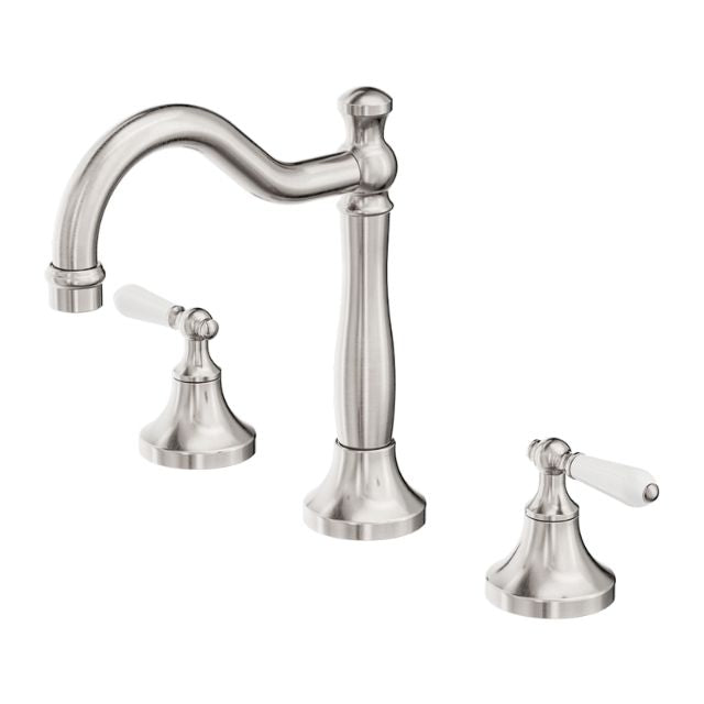 Nero York brushed nickel 3-piece basin tap set with white porcelain lever handles and curved spout on white background