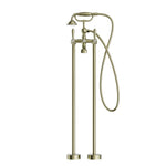 Nero York floor-mounted bath set with hand shower in aged brass, shown front on against a white background