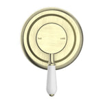 Nero York shower mixer in aged brass with white porcelain lever, round wall plate front view