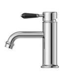 Nero York straight basin mixer in chrome with black porcelain lever, side view on white background
