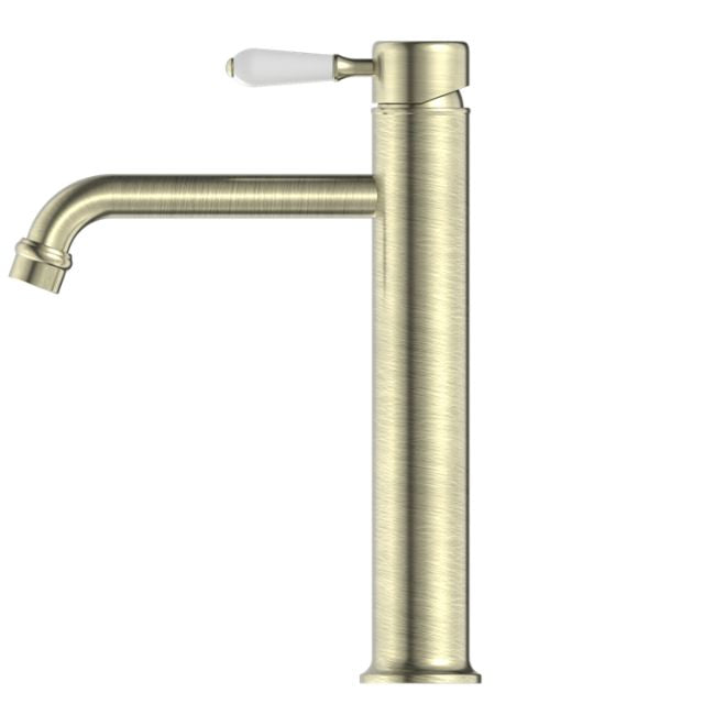 Nero York tall basin mixer tap in aged brass with white porcelain lever, side view on white background