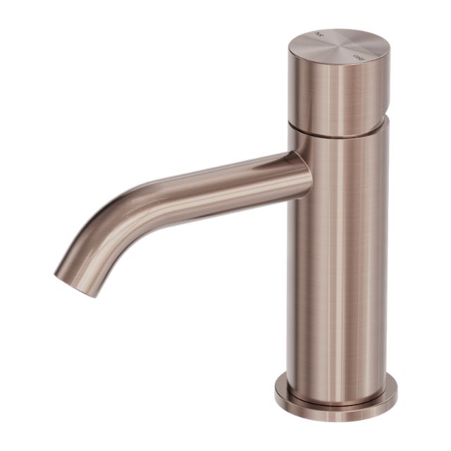Nero Zen handless basin mixer tap in brushed bronze, hob mounted, with cylindrical body and curved spout