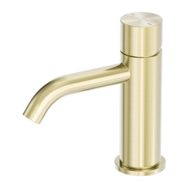 Nero Zen basin mixer tap in brushed gold, handless cylindrical design with curved spout, hob mounted view