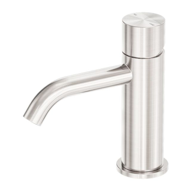 Nero Zen handless basin mixer tap in brushed nickel, with curved spout and cylindrical hob-mounted body, front view