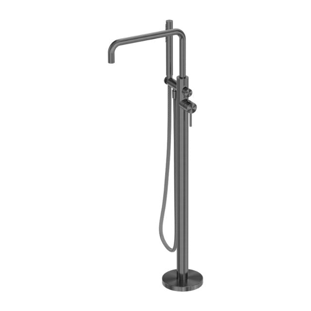 Nero Zen freestanding bath mixer in graphite, floor-mounted with hand shower hose and round base, shown on white background