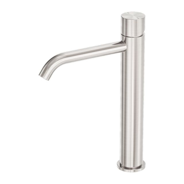 Nero Zen tall basin mixer tap in brushed nickel, handless cylindrical design with curved spout, side view on white background