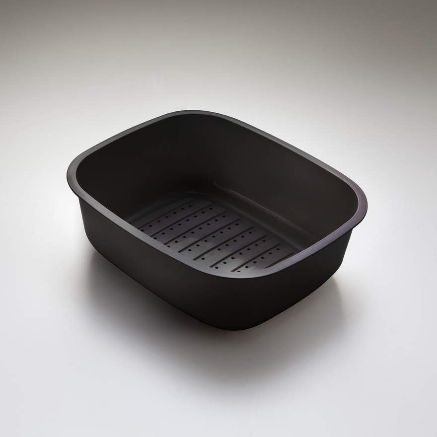 Oliveri charcoal plastic 3/4 bowl sink colander with perforated base, shown on a white background