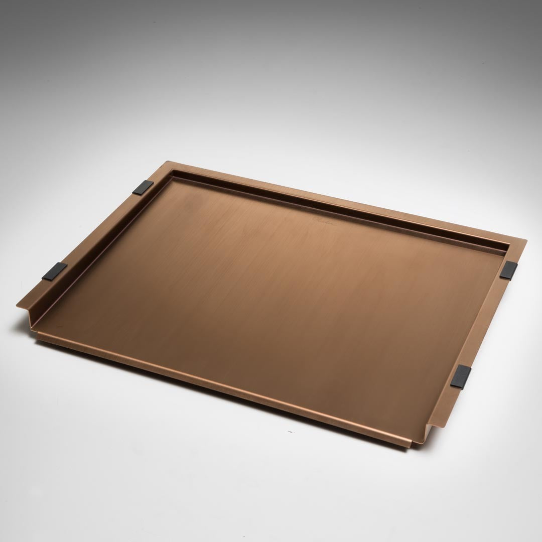 Oliveri copper bench top drainer tray, rectangular stainless steel tray with angled lip and black pads on white background