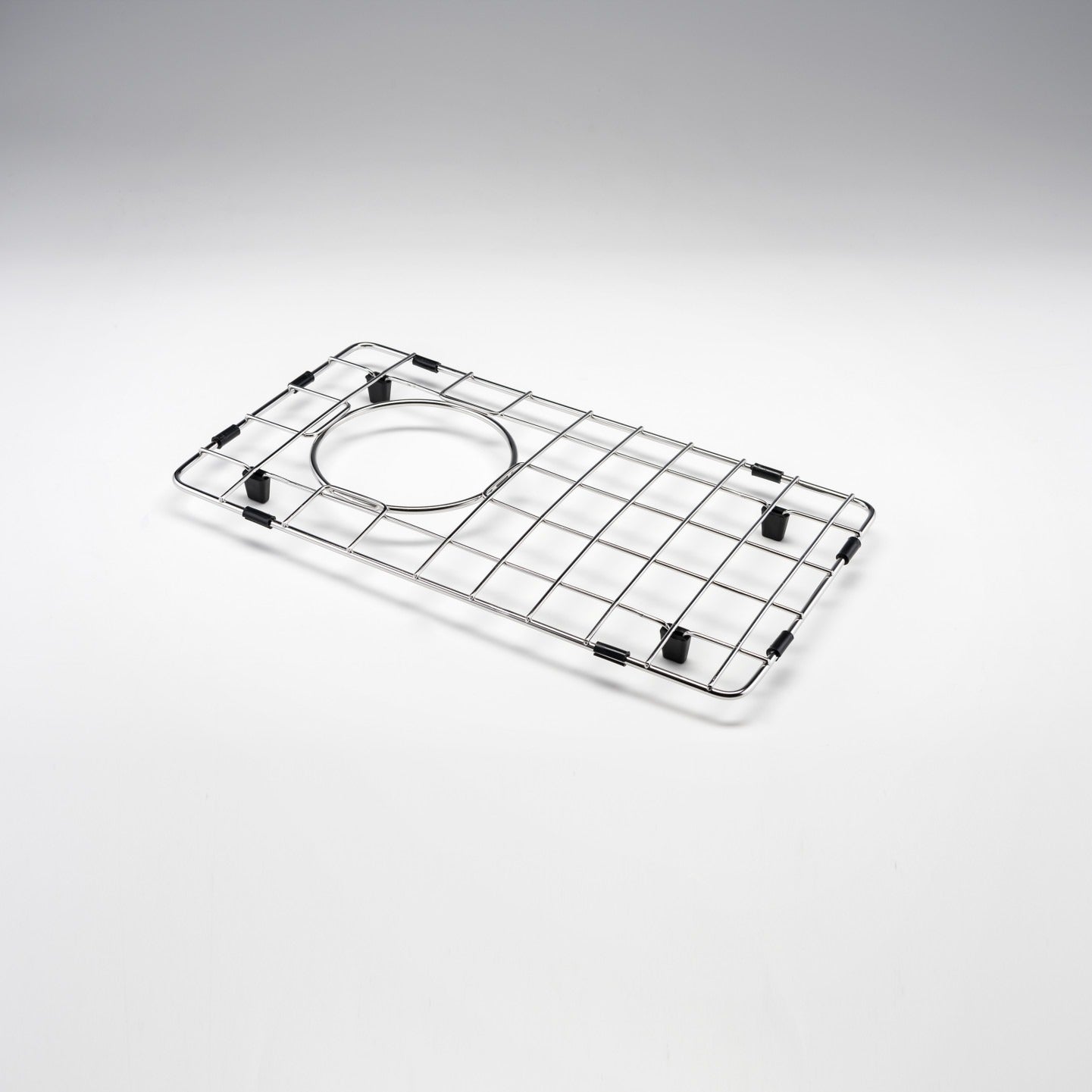 Oliveri Spectra stainless steel half bowl sink protector, rectangular wire grid with round cut-out, angled view