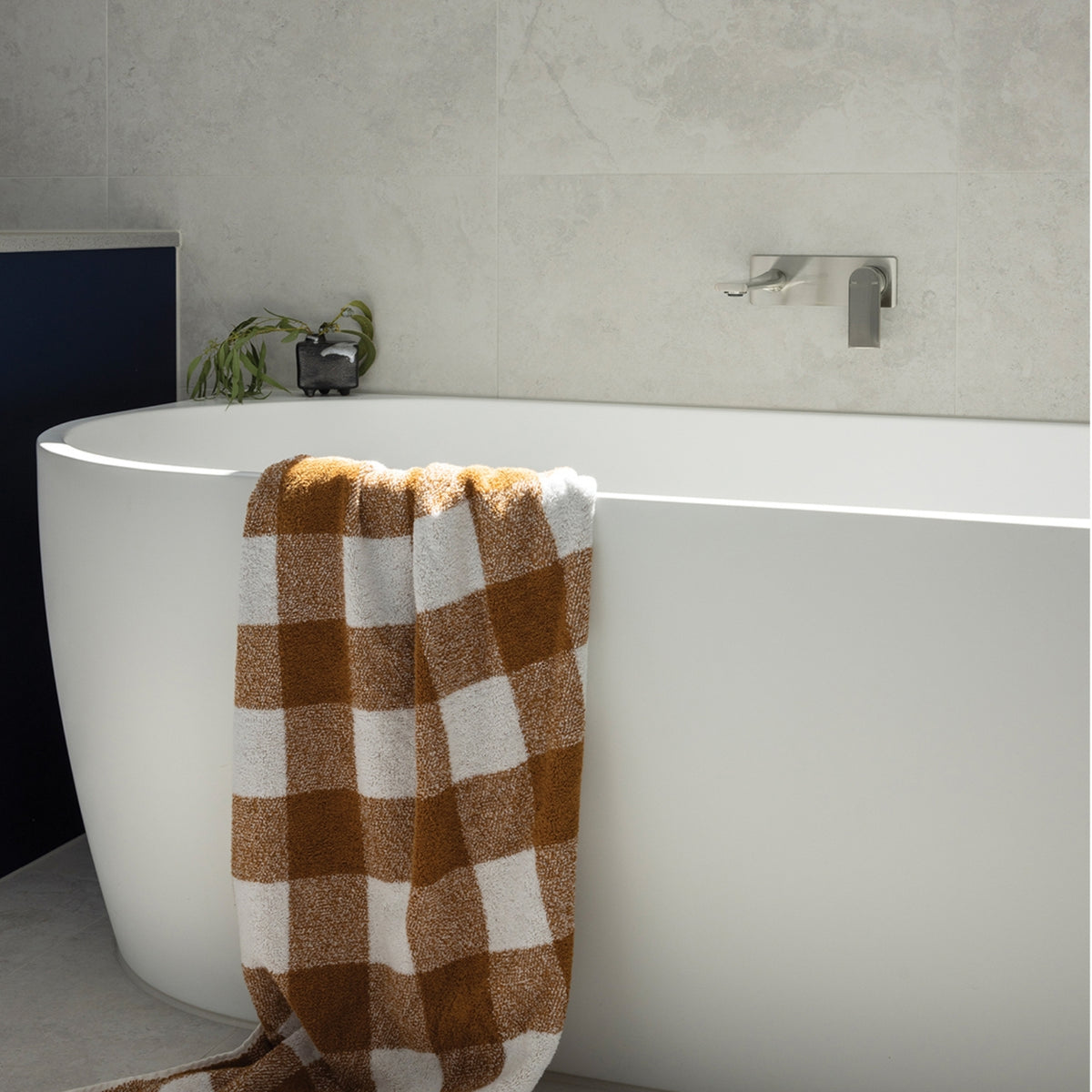 Phoenix Teel SwitchMix wall basin mixer set in brushed nickel, mounted above a freestanding bath in a modern bathroom