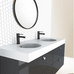 Phoenix Vivid Slimline matte black basin mixers on a double vanity, shown in a modern bathroom setting