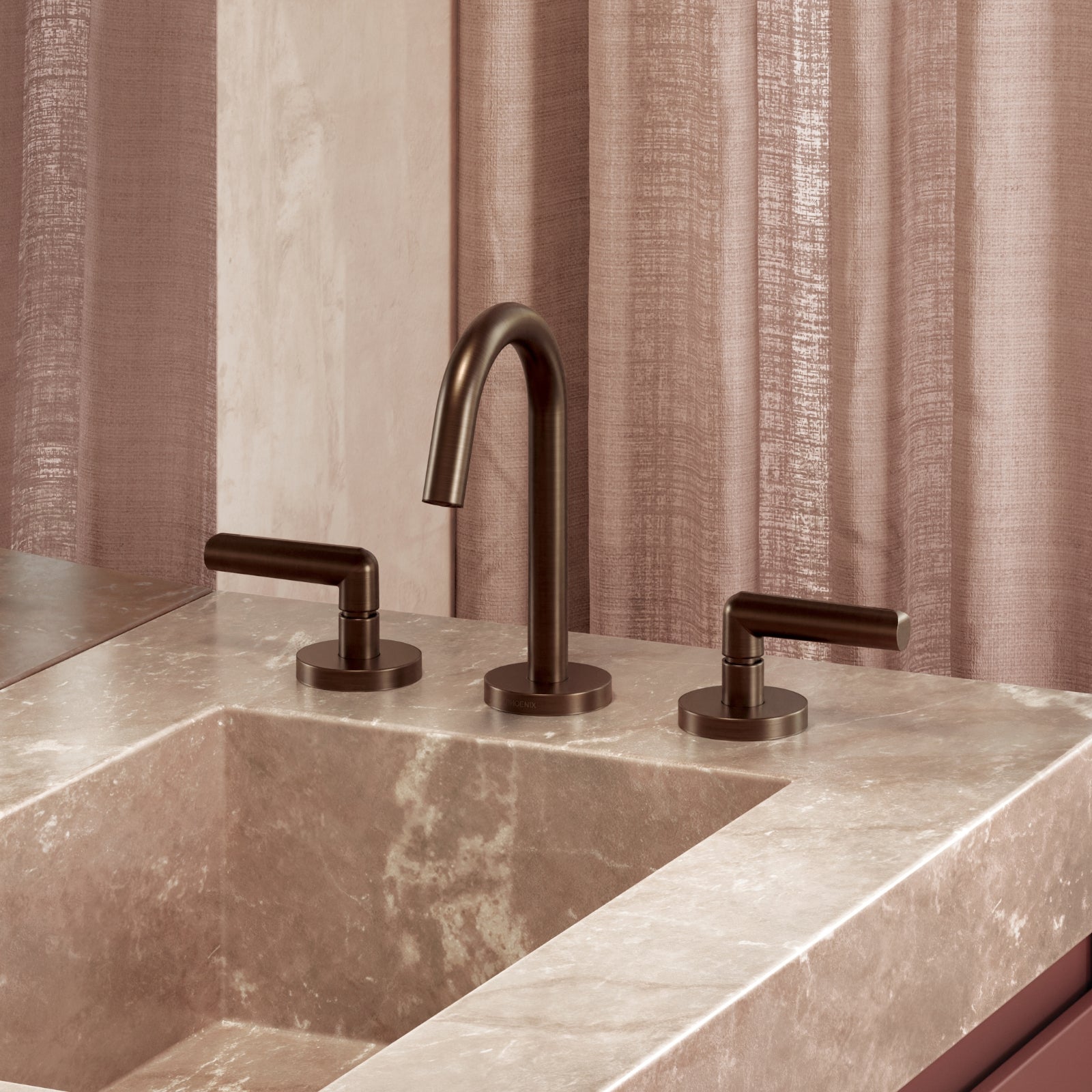 Phoenix Vivid Slimline Plus 3 piece basin set in brushed bronze, hob mounted on a stone vanity in bathroom setting