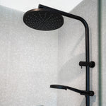 Phoenix Vivid Slimline twin shower in matte black, with round overhead shower and hand shower on rail, wall mounted in bathroom