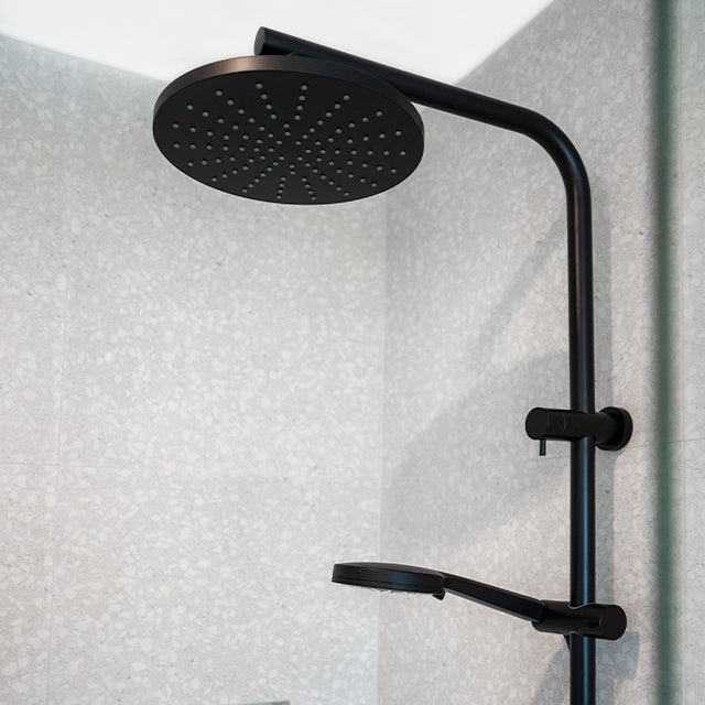 Phoenix Vivid Slimline twin shower in matte black, with round overhead shower and hand shower on rail, wall mounted in bathroom