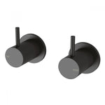 Phoenix Vivid Slimline wall top assemblies in matte black, with slim pin lever hot and cold taps shown front-on