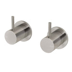 Pair of Phoenix Vivid Slimline wall top assemblies in brushed nickel, with slim pin lever handles, shown on white background