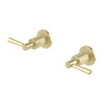 Phoenix Wiltern wall top assemblies in brushed gold, pair of fluted wall-mounted tap handles on white background