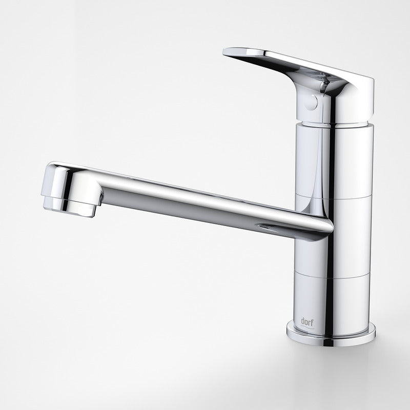 Dorf Kip chrome sink mixer with swivel spout, polished chrome finish, side view on white background