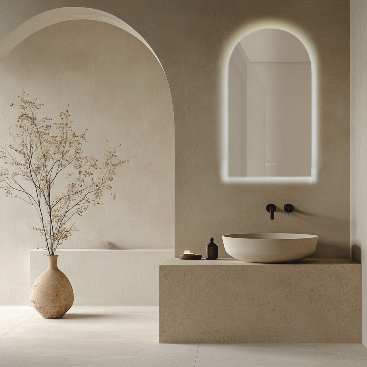 Radiant Ark frameless LED arch mirror in a warm bathroom setting above a vanity, with soft illuminated outline