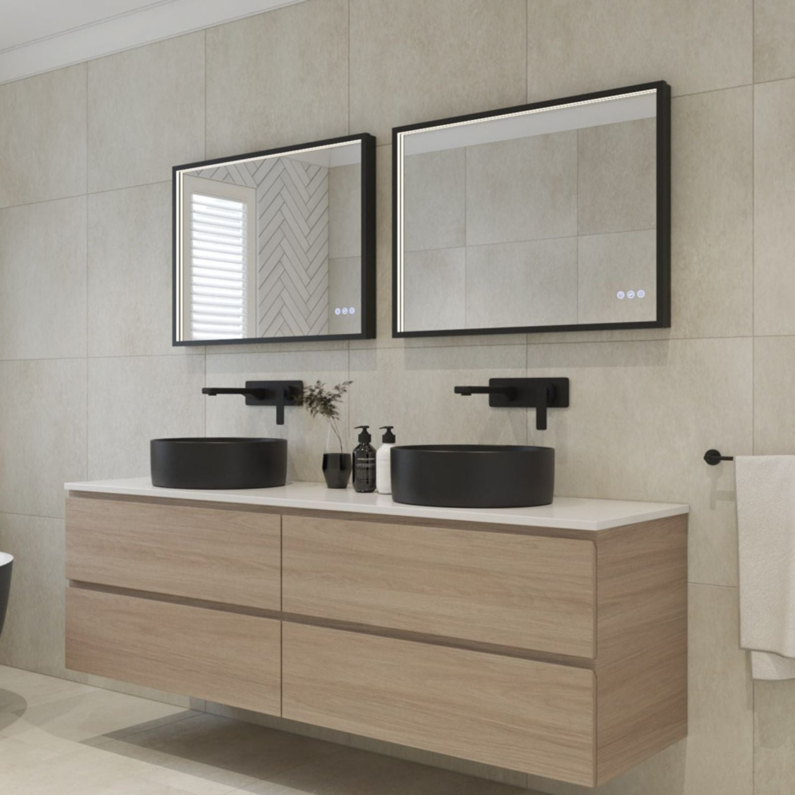 Radiant Roek black rectangular LED mirror above a double bathroom vanity, shown in a modern ensuite setting