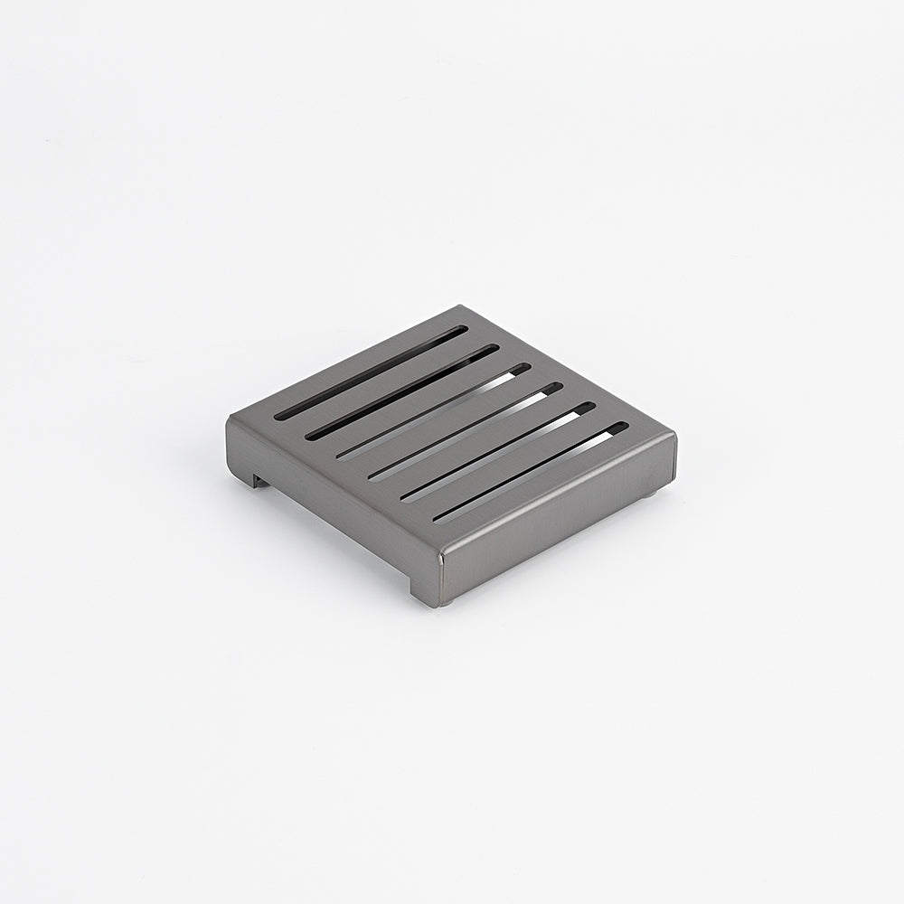 Radiant square slotted floor grate in gun metal grey, 100mm x 100mm, stainless steel, shown on white background