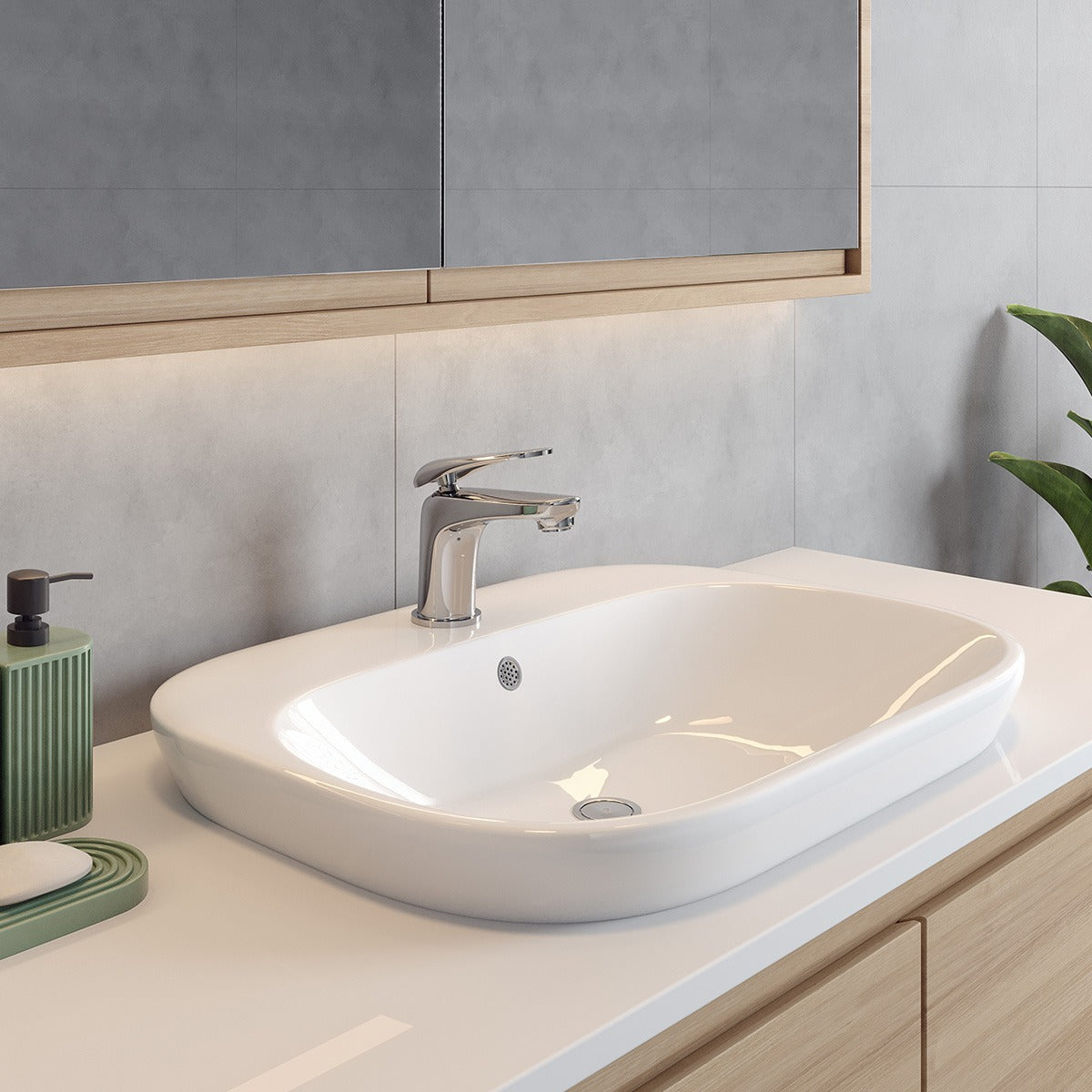 Raymor Alpha white semi inset basin with chrome mixer tap on a vanity in a modern bathroom scene