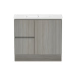 Raymor Ascot slim vanity in Oxford woodgrain, white top, front view with left-hand drawer and right door