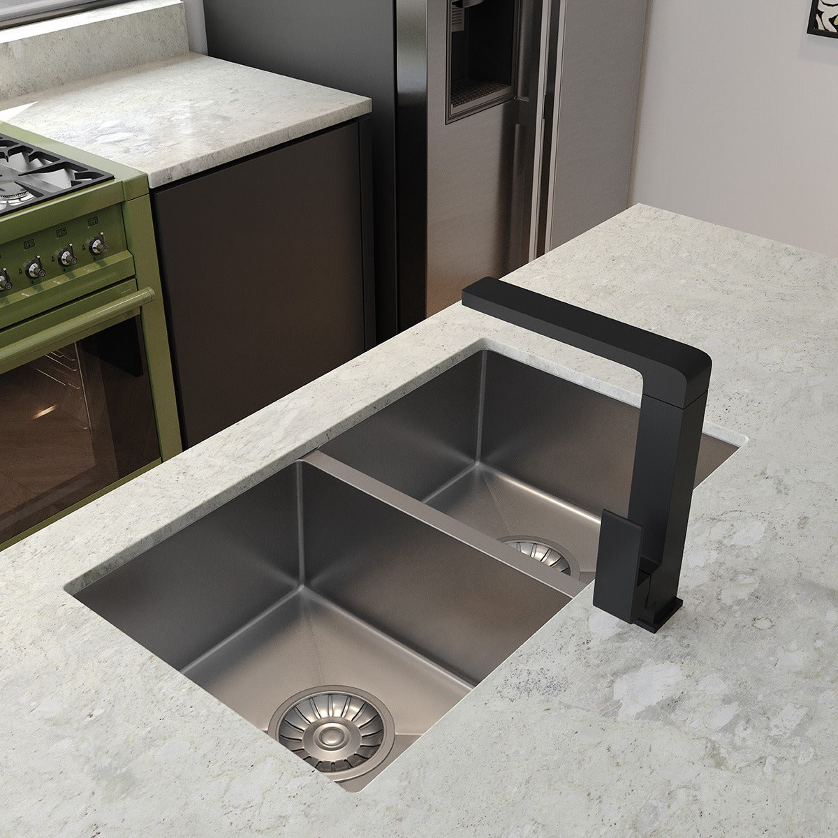 Raymor Edge II black square sink mixer over stainless steel double kitchen sink and stone benchtop