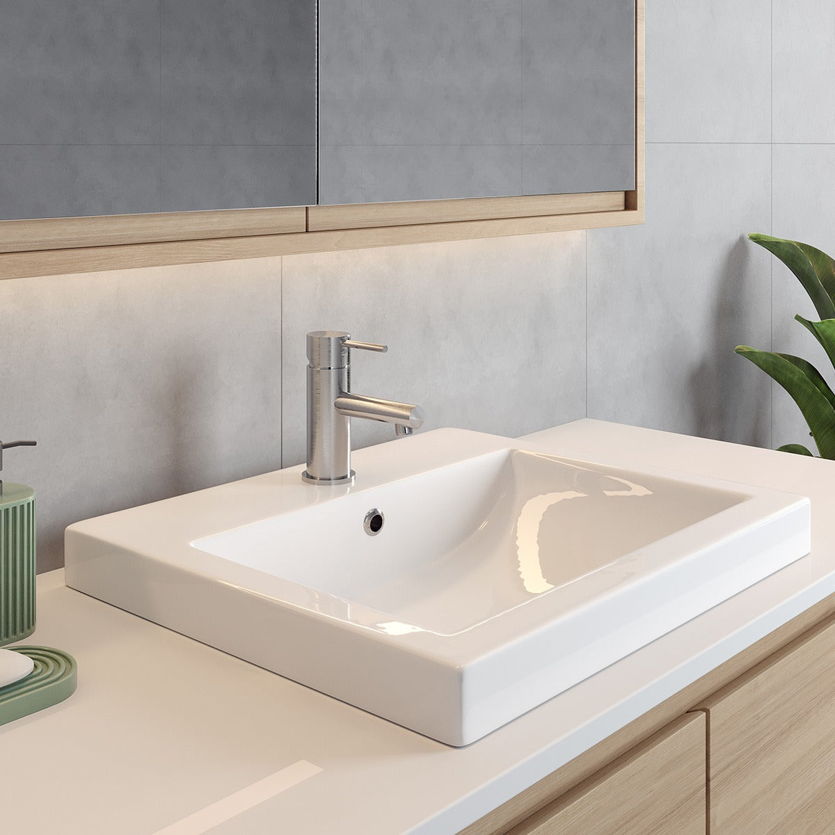 Raymor white semi inset rectangular basin with single tap hole, shown installed in a modern vanity top