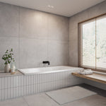 Raymor Projix white inset bath in a tiled bathroom, rectangular design with black wall mixer and window seat